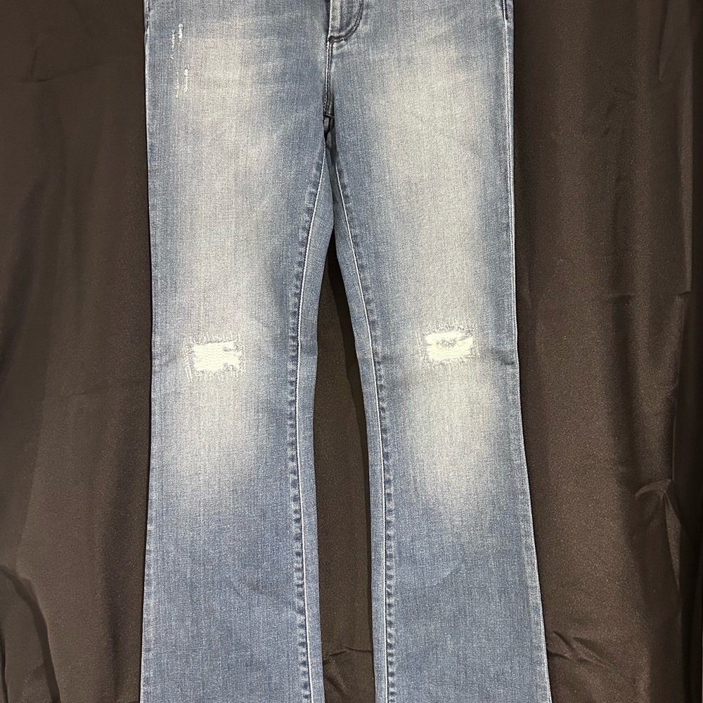 TOMMY RIPPED & REPAIRED FLARE JEANS IN LT. BLUE.